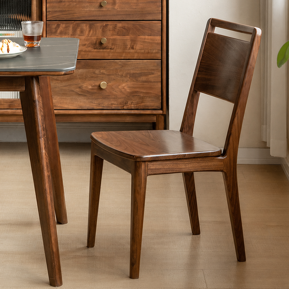 Natural solid walnut chair paired with dining table for everyday family meals
