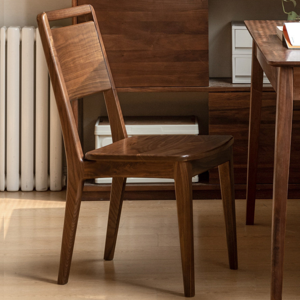 Truro walnut dining chair with durable solid wood construction and classic modern design