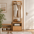 Warburg natural solid oak coat rack with lower drawer, open shelf and clothes hanging in entryway setting