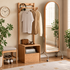 Warburg natural oak coat rack with clothes rail, storage drawer and bedside display in warm neutral room