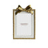 White and gold bow photo frame with gold bead trim for 4 x 6 inch photos