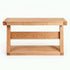 Zetland Natural Solid Oak Console Table styled with round mirror, table lamp, plants, and books in a modern living room