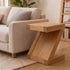 Zetland Natural Solid Oak Lamp Table styled beside a fabric sofa in a warm living room