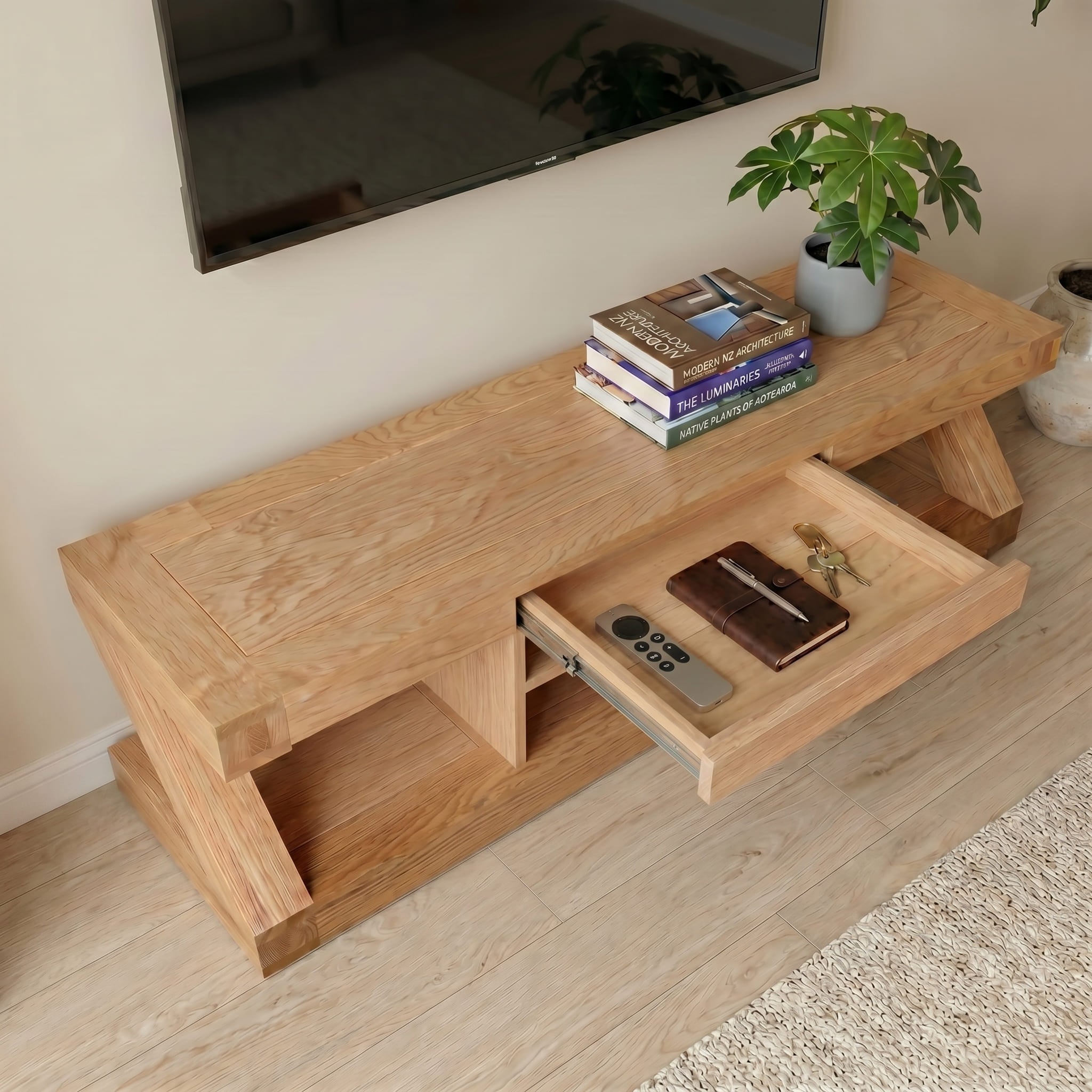 Zetland Natural Solid Oak Large Entertainment Unit styled under a wall-mounted TV in a modern living room