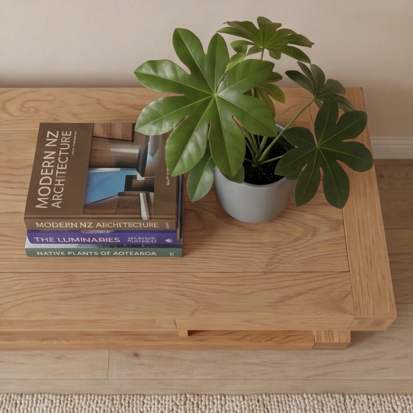 Natural solid oak media console with warm timber texture and minimalist living room styling