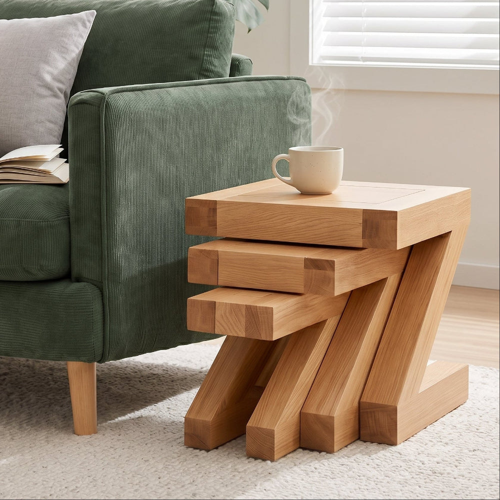Zetland Natural Solid Oak Nest of Tables styled beside a green fabric sofa in a bright living room