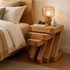 Solid oak nest of tables with thick timber legs and layered square tabletop design