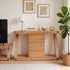 Natural solid oak sideboard cabinet styled with home décor, plants, and tableware storage