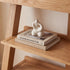 Small solid oak bookcase for displaying books, plants, framed photos, and home décor